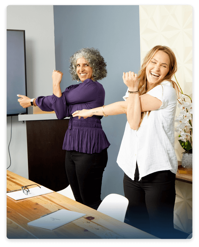 two women stretching