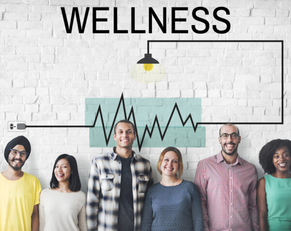 A graphic with the word "wellness" above six people at a workplace wellness class.