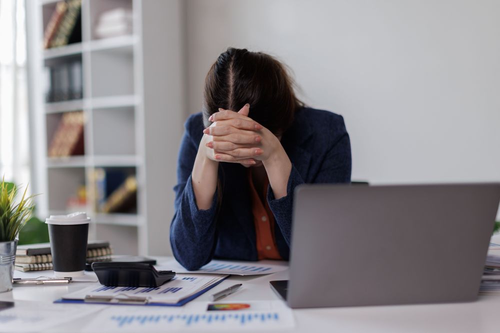 Woman tired while working, resting head